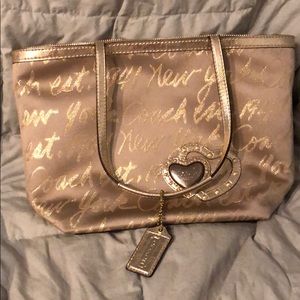 Authentic gold on gold COACH